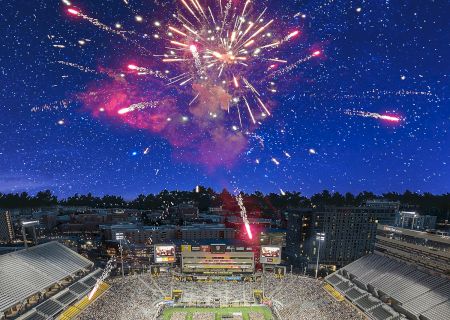 Fireworks explode above a sports stadium at night, with a green field, seating, and a crowd below, celebrate boldly.